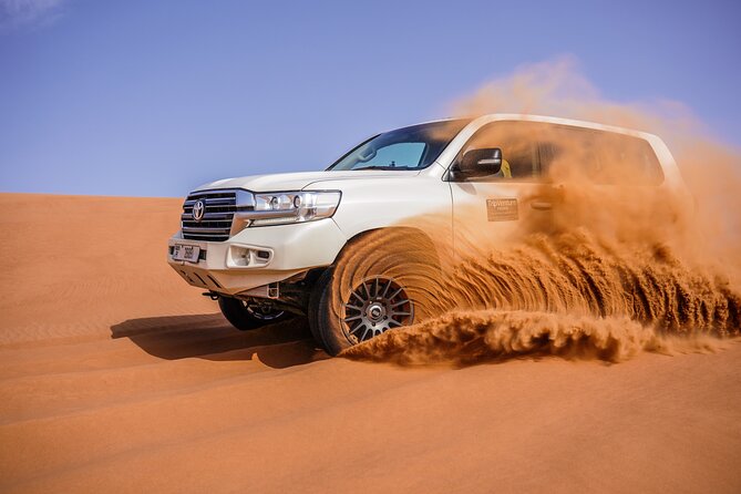 Dubai Desert Safari, BBQ, Live Shows, Camel, Sandboard (7-Hours) - Key Points