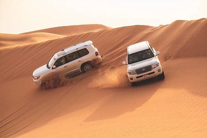 Dubai Desert Safari With ATV, Dune Bash, Camel Ride and BBQ - Key Points