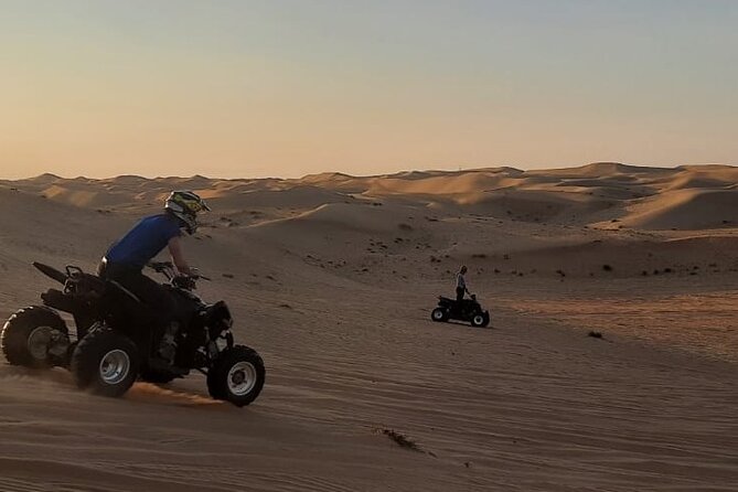 Dubai Private Guided Desert Quad Bike Tour With Transfers - Key Points