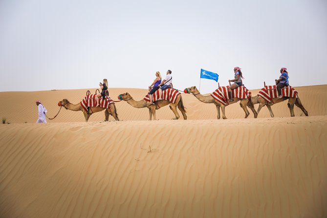 Dubai Red Dunes Desert Safari, Sandsurf, Camel & Quad Bike Option - Key Points