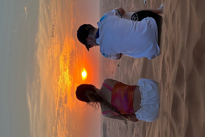 Dubai Sunset Red Dune Desert Safari, Sandboarding and Camel Ride - Key Points