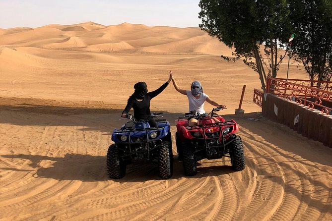 Dubai: Unique SUNSET Quad Bike Red Dunes Safari - Key Points