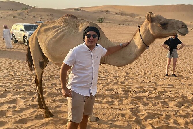 Dubai:Desert Safari BBQ Dinner, Dune Bashing,Camel&Sandboarding - Key Points