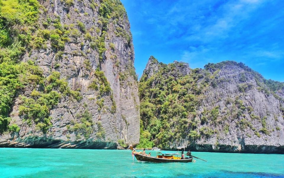 From Phi Phi: Full Day Phi Phi Island Tour by Speed Boat. - Key Points