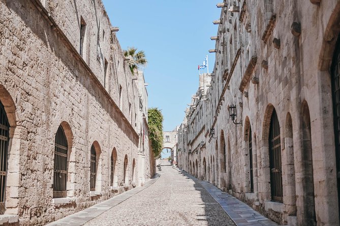 Guided Rhodes City by Night With Lunch & Live Greek Music - Key Points