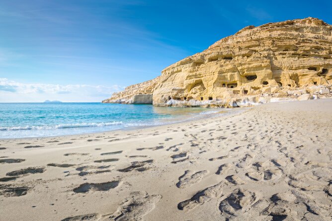 Half Day Trip to Matala Hippie Beach and Caves From Heraklion - Key Points
