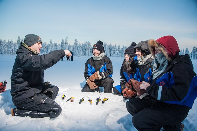 Lappish Lunch Break -Snowmobiling, Ice Fishing and Tasty Food - Snowmobiling Adventure in Lapland