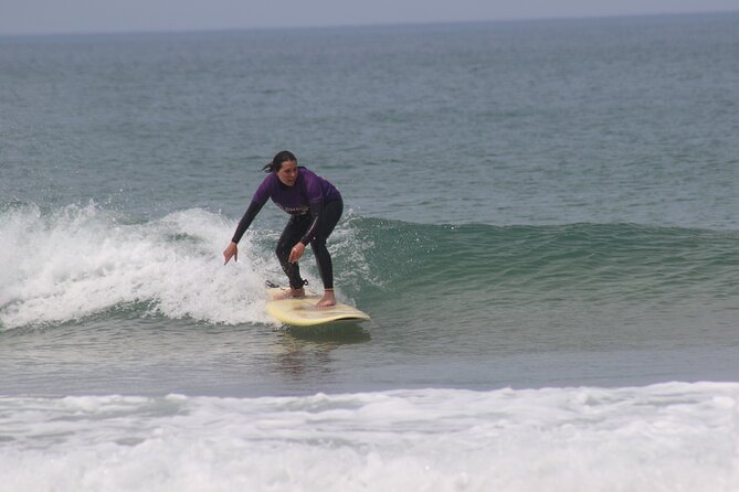 Learn to Surf Lesson With Transport From Porto - Activity Overview