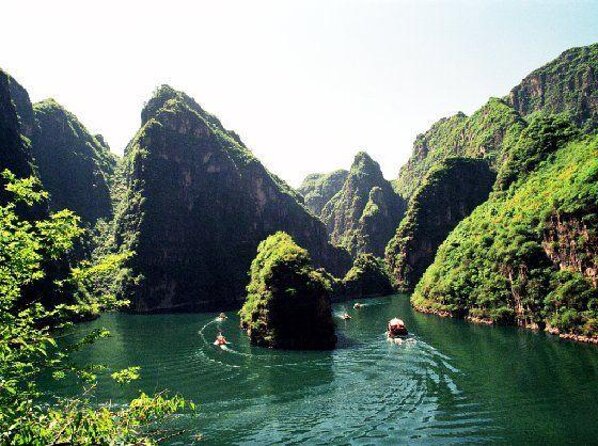 Longqing Gorge and Guyaju Caves Excursion With English Speaking Driver - Key Points