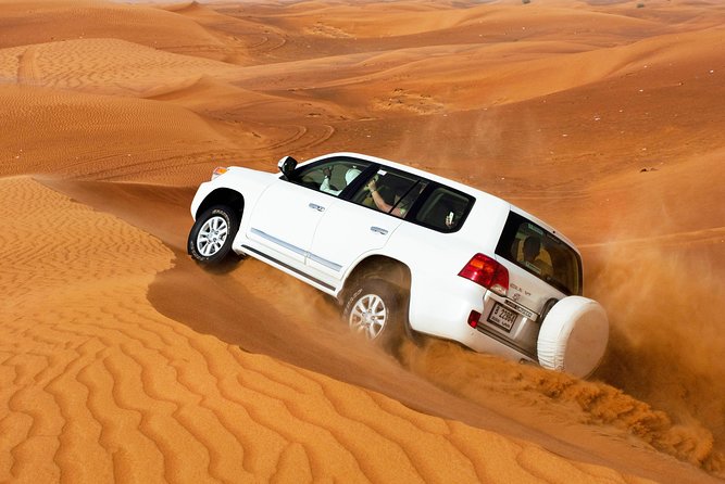 Morning Dubai Desert Safari With Sand Boarding and Camel Ride - Key Points