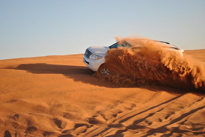 Night Desert Safari Sand Boarding Camel Ride Inland Sea - Key Points