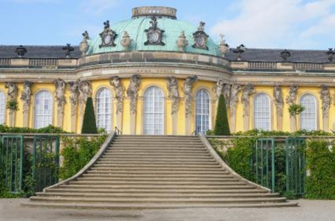 Potsdam Private Sightseeing Tour With Vehicle and Photographer Guide - Key Points