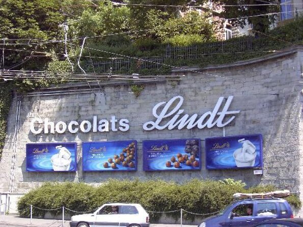 Private Day Tour Lindt Home of Chocolate and FIFA Museum Zurich - Key Points