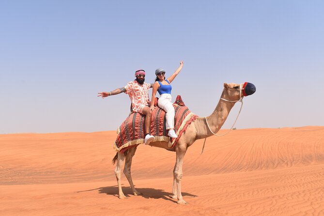 Private Desert Excursion Camel Ride Sandboard & Buffet BBQ Dinner - Key Points