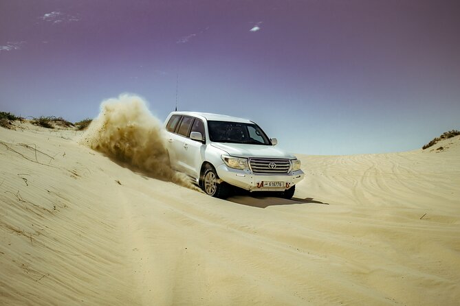 Private Desert Safari With Inland Sea Visit & Sand Boarding - Key Points