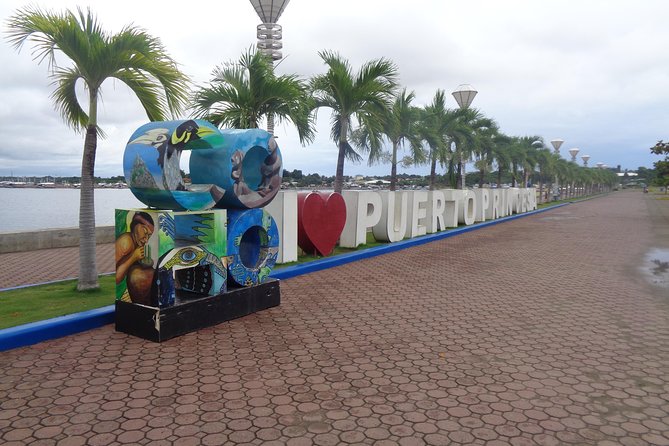 Puerto Princesa Day Tour: Morning Beach Tour Afternoon City Tour. - Key Points
