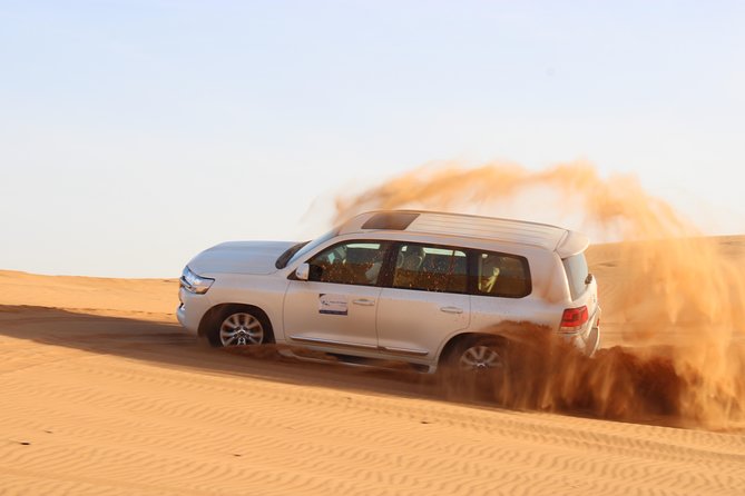 Red Dunes Desert Safari, Sand Board, Camel Ride With BBQ Dinner in Premium Camp - Key Points