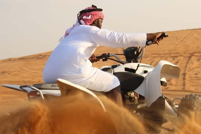 Red Dunes Tour in Desert Safari With Quad Biking and Live Shows - Key Points