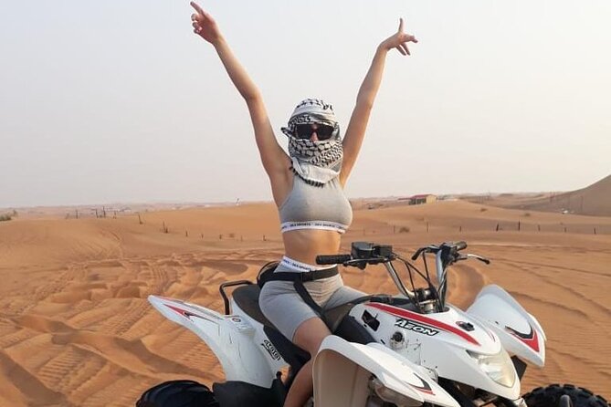 Red Sand Morning Desert Safari With Quad Bike, Sand Boarding & Camel Ride - Key Points