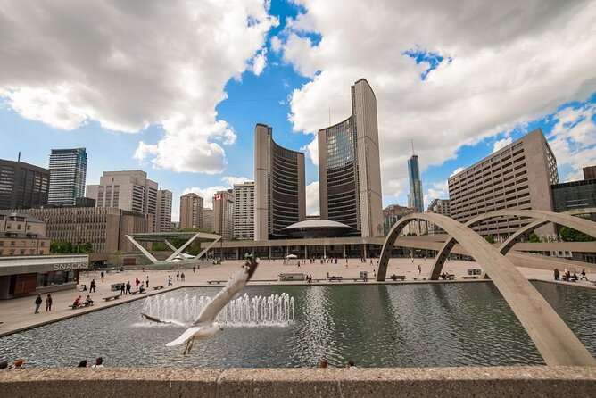 Torontos Financial District and City Halls: A Self-Guided Audio Tour - Key Points