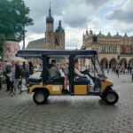 1 a glance at the krakow old town from the deck of a electric golf cart A Glance at the Krakow Old Town From the Deck of a Electric Golf Cart
