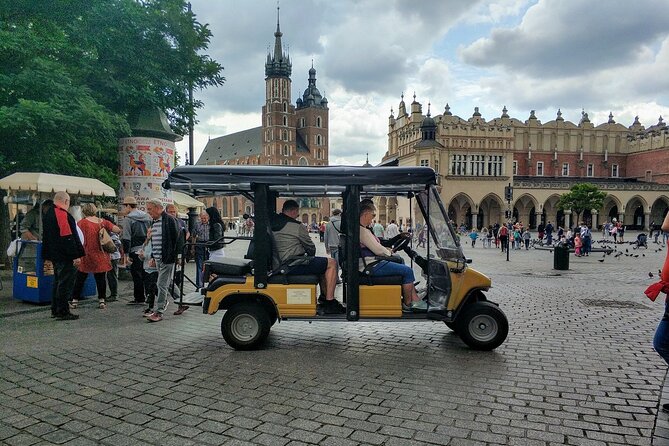 A Glance at the Krakow Old Town From the Deck of a Electric Golf Cart
