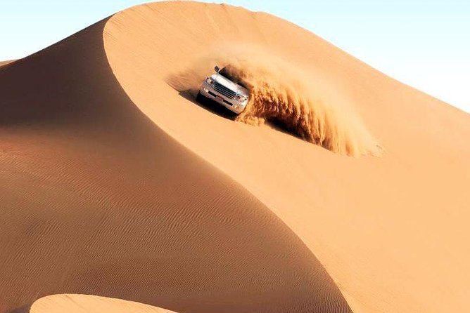 Abu Dhabi Desert Safari With BBQ, Camel Ride, and Arabian Show