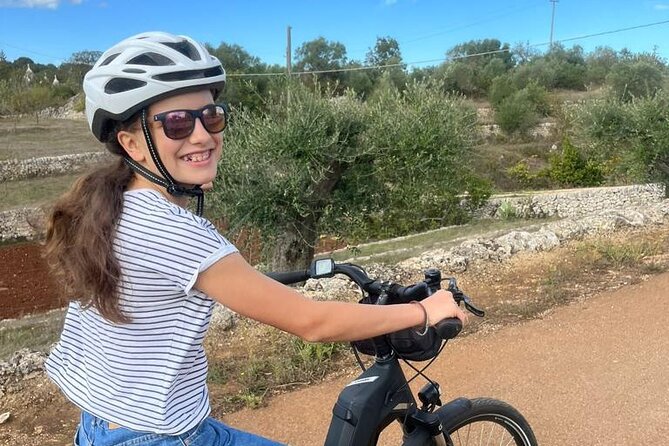 Alberobello on an E-Bike. the Countryside, a Mill, and a Farm