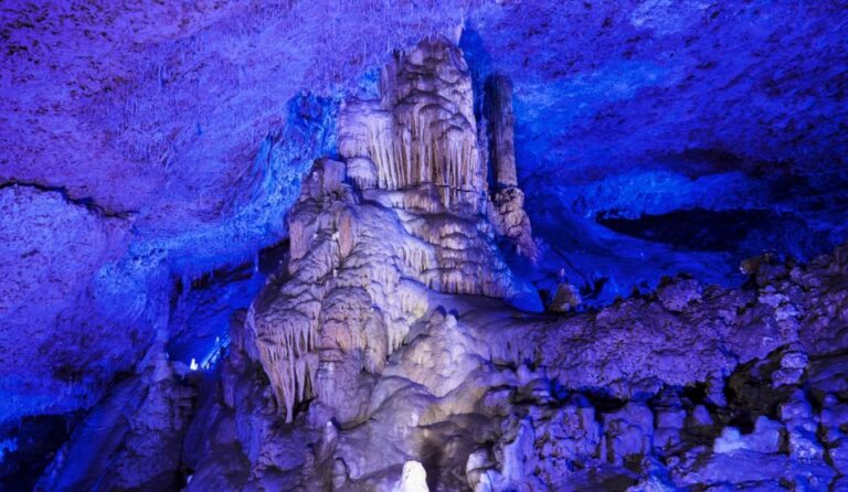 Alcudia: Half-Day Caves of Hams, Blue Caves and Documentary