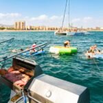 1 barcelona catamaran party cruise with bbq meal Barcelona: Catamaran Party Cruise With BBQ Meal