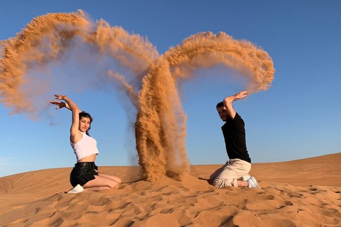 Desert Safari With Dune Bashing, Camel Ride, BBQ Dinner, Sand Board & Live Shows