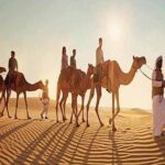 1 dubai desert quad bike safari camel ride sand surf bbq Dubai: Desert Quad Bike Safari, Camel Ride, Sand Surf, & BBQ
