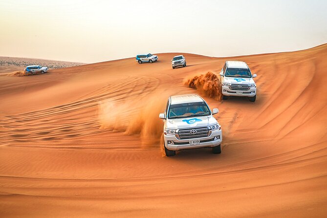 Dubai Desert Safari With Live Show, BBQ Dinner, Camel Ride & Sand Board Options