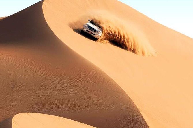 1 dubai desert safari with quad bike dune bashing camel ride bbq dinner Dubai Desert Safari With Quad Bike & Dune Bashing & Camel Ride & BBQ Dinner