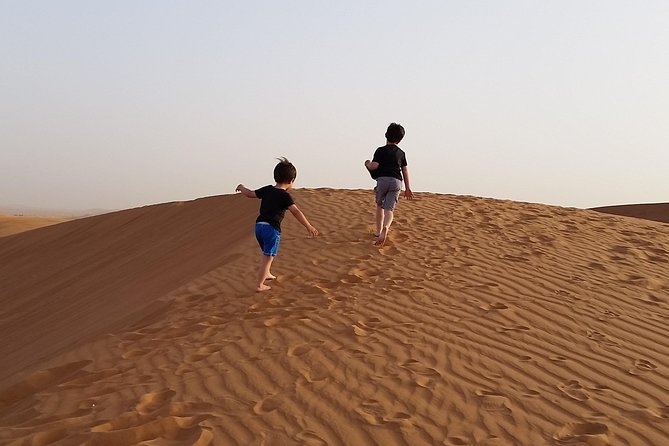 Dubai Dune Bashing Safari With BBQ Dinner, Entertainment and Camel Ride