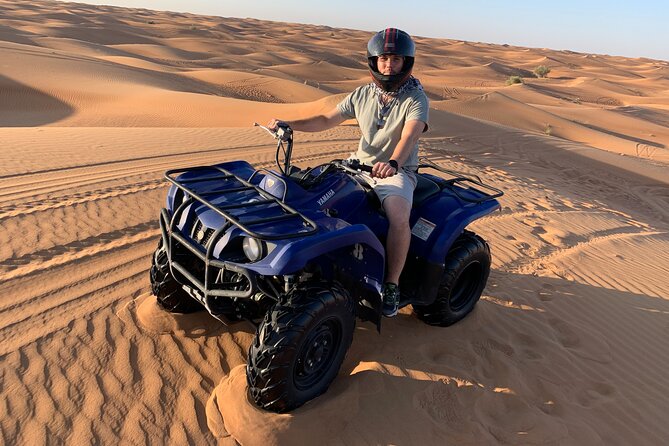 Dubai Morning Desert Quad Bike Tour With Sandboarding & Camel Ride