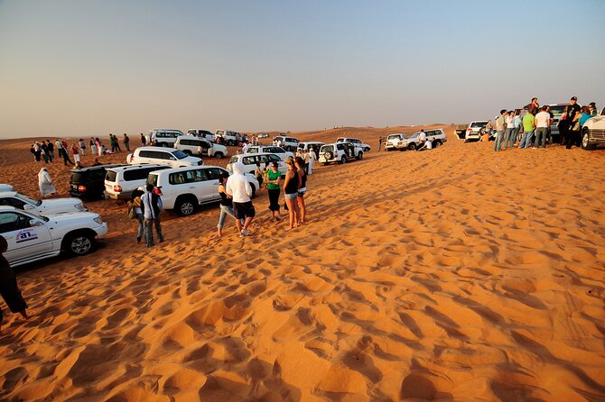 Enjoy the Dubai Fossil Rocks Desert With Sandboarding, Camel Ride,& BBQ Dinner