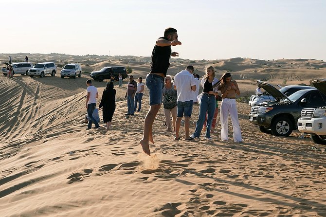 Exclusive Sunrise Desert Safari With Camel Ride Sand Boarding Dune Bashing