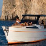 1 from positano private tour to capri on a gozzo boat From Positano: Private Tour to Capri on a Gozzo Boat