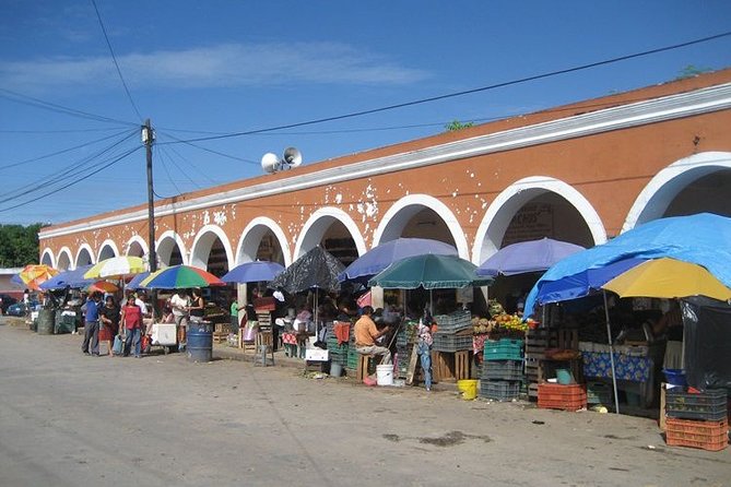 Go Maya by Bike in Valladolid (Local Market-Cenotes-Mayan Family)