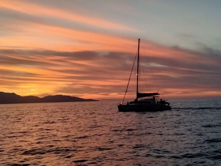 Hersonissos: Sunset Private Catamaran to St George Bay