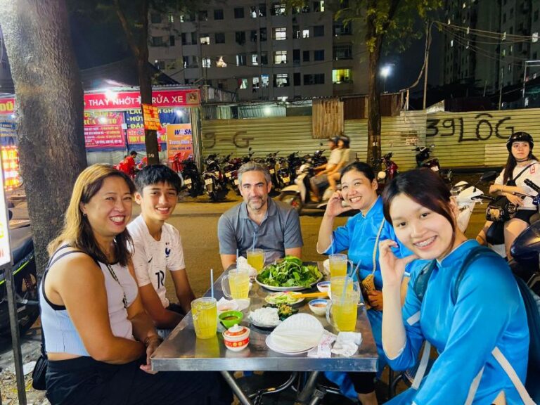 KISSTOUR Saigon By Night & Street Food Tour on Motorbike