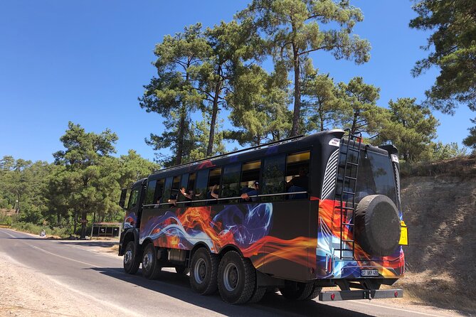 1 monster truck and 4x4 omnibus with rafting in koprulu park from side Monster Truck and 4x4 Omnibus With Rafting in Koprulu Park From Side