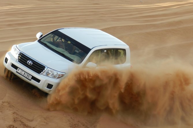 Morning Red Dunes Desert Safari With Quad Bike and Sand Boarding