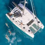 1 mykonos rhenia island catamaran cruise with meal and drinks Mykonos: Rhenia Island Catamaran Cruise With Meal and Drinks