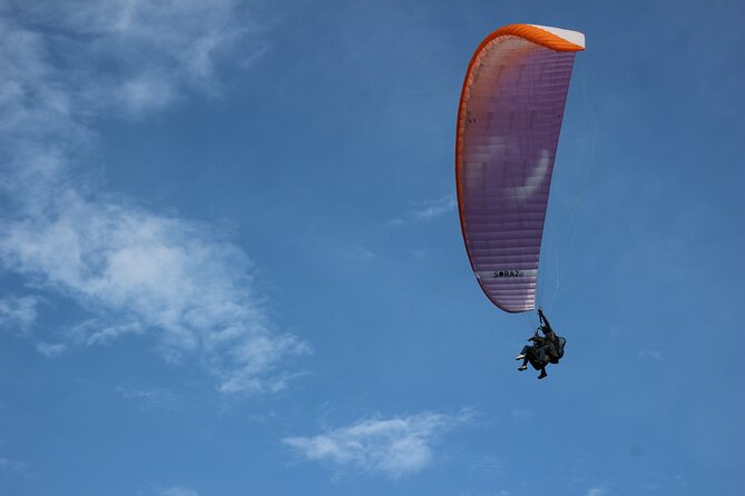 Paragliding Flight Over a Valley of Mountains and Waterfalls Video