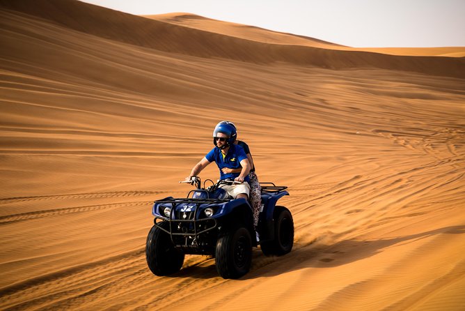 Red Dunes by Quad Bike, Camel Ride, Sandboarding and BBQ - Glide Down the Red Sand Dunes