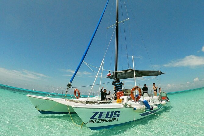 Reef Snorkeling by Catamaran Plus Beach Club  – Cozumel