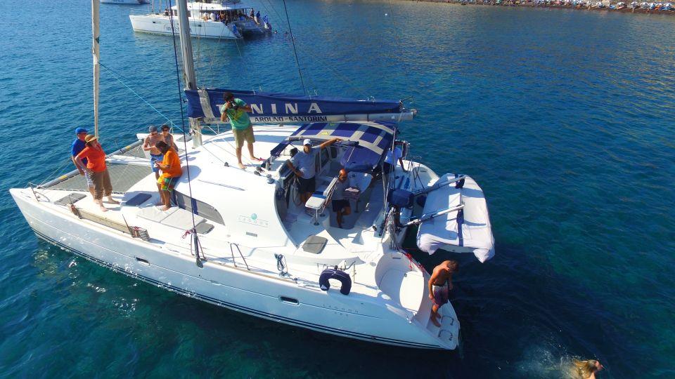 1 santorini 7 hour private catamaran cruise with food drink Santorini: 7-Hour Private Catamaran Cruise With Food & Drink