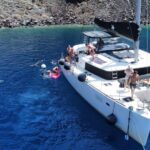 1 santorini catamaran cruise with swimming meal and open bar Santorini Catamaran Cruise With Swimming, Meal and Open Bar